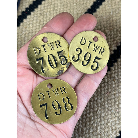T38. 3 - 1 1/2" Brass Tags with Letters & Numbers