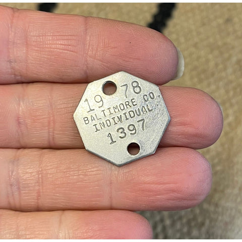 T33. 1978 steel dog tag