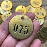 Round Brass Number Tag with Black Numbers, 1 1/2" (1)