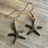 Gold Tone Starfish Charm Earrings
