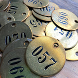 Round Brass Number Tag with Black Numbers, 1 1/2" (1)